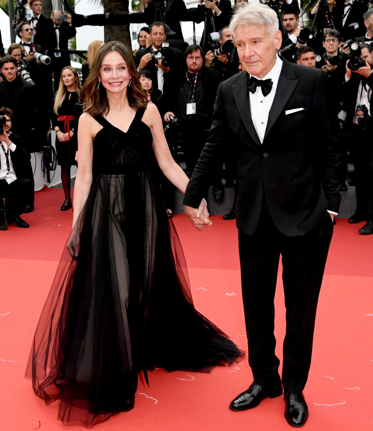 Calista Flockhart and Harrison Ford attending the premiere of Indiana Jones and the Dial of Destiny during the 76th Cannes Film Festival
