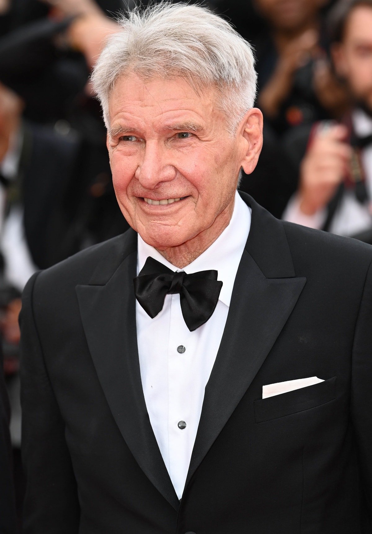 Harrison Ford looking dapper in his classic black tuxedo with a black bowtie