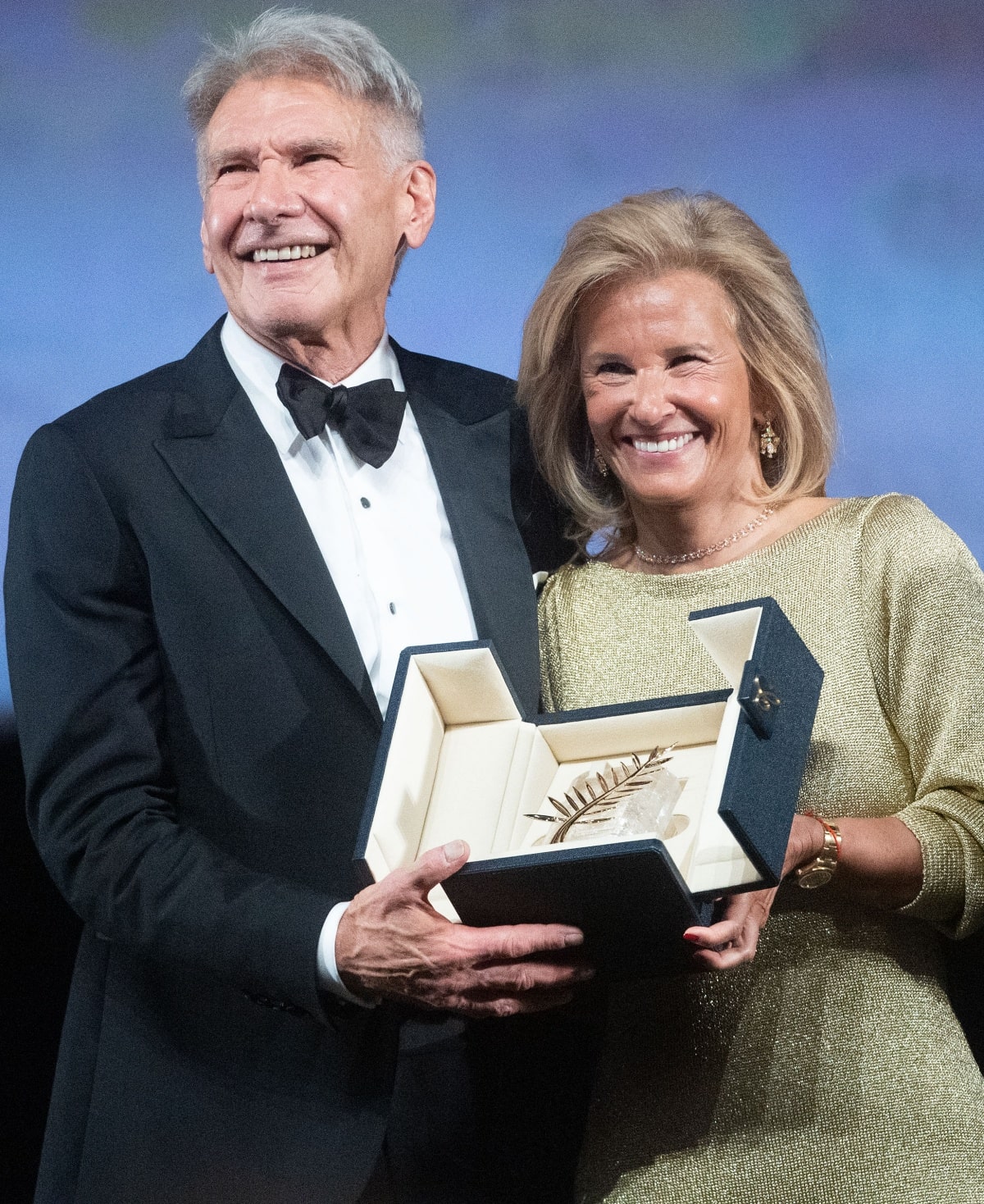 Harrison Ford receiving the Honorary Palme d’Or from Cannes director Iris Knobloch