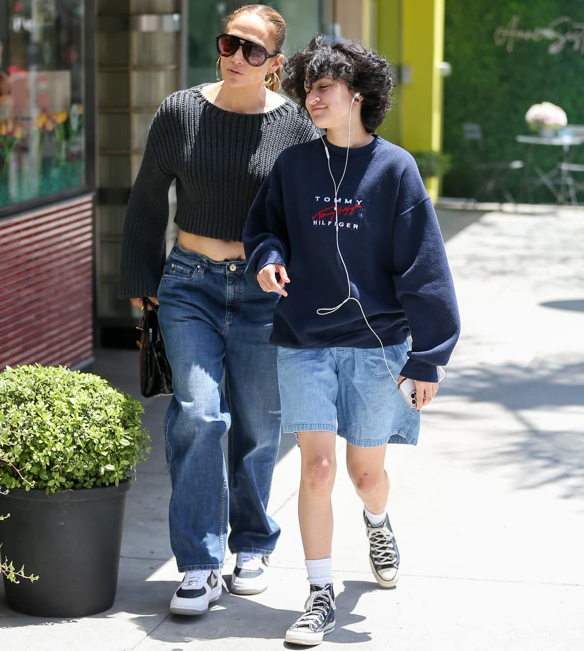 Emme Muñiz kept it casual in an oversized hoodie with denim shorts while out and about in Los Angeles with mom Jennifer Lopez