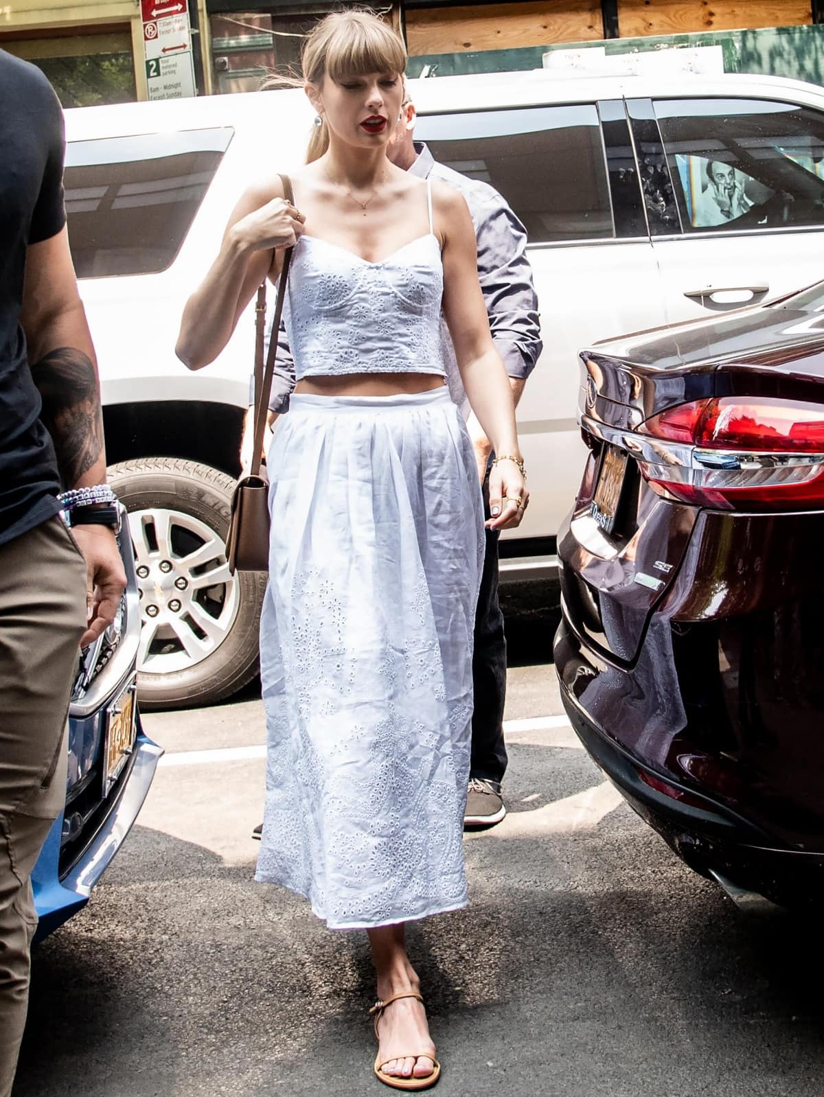 Taylor Swift in a chic white Polo Ralph Lauren outfit while heading to Electric Lady Studios in New York City