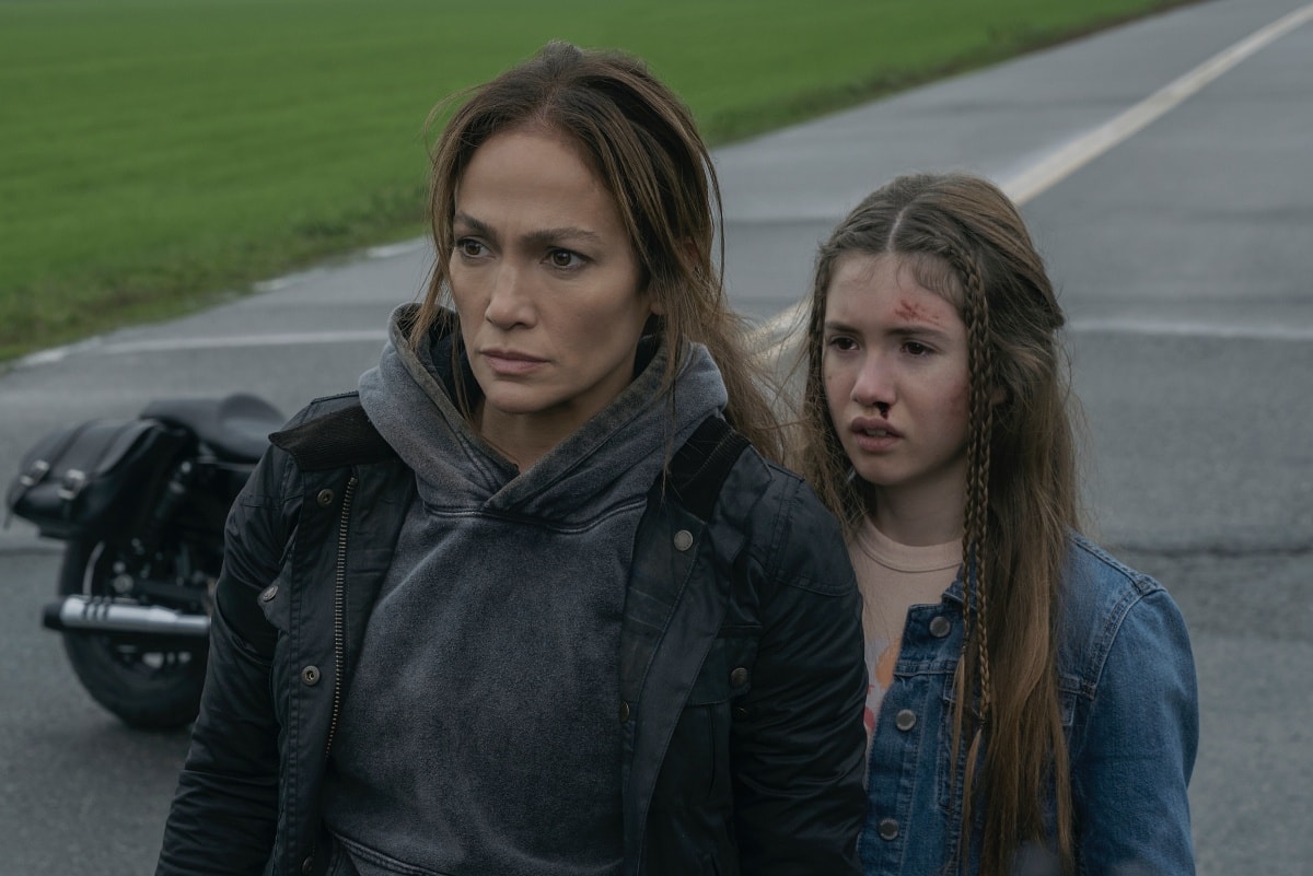 Jennifer Lopez as The Mother and Lucy Paez as Zoe in the 2023 action-drama film The Mother