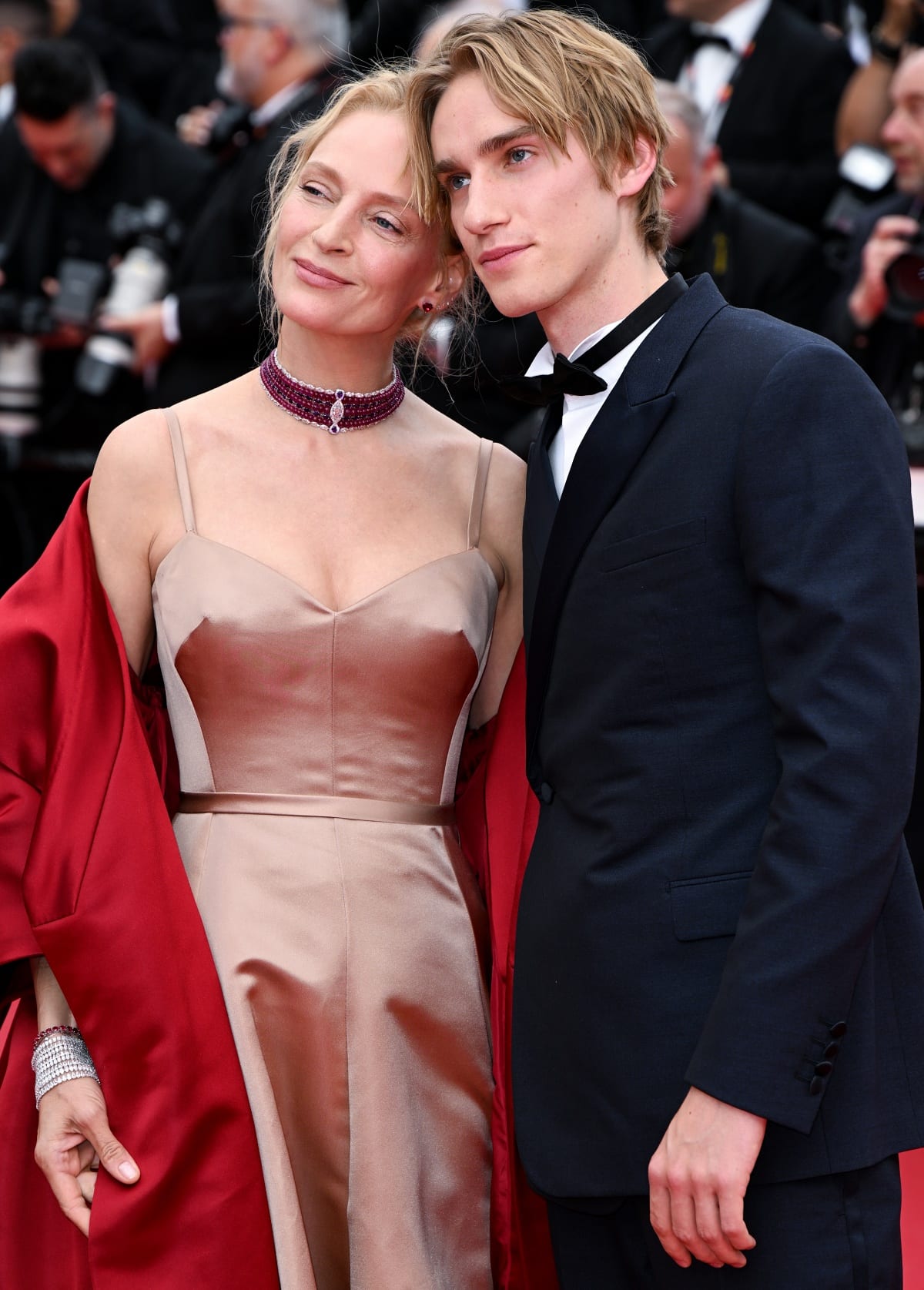 Uma Thurman with son Levon Hawke at the Jeanne du Barry screening and opening ceremony of the 76th Cannes Film Festival