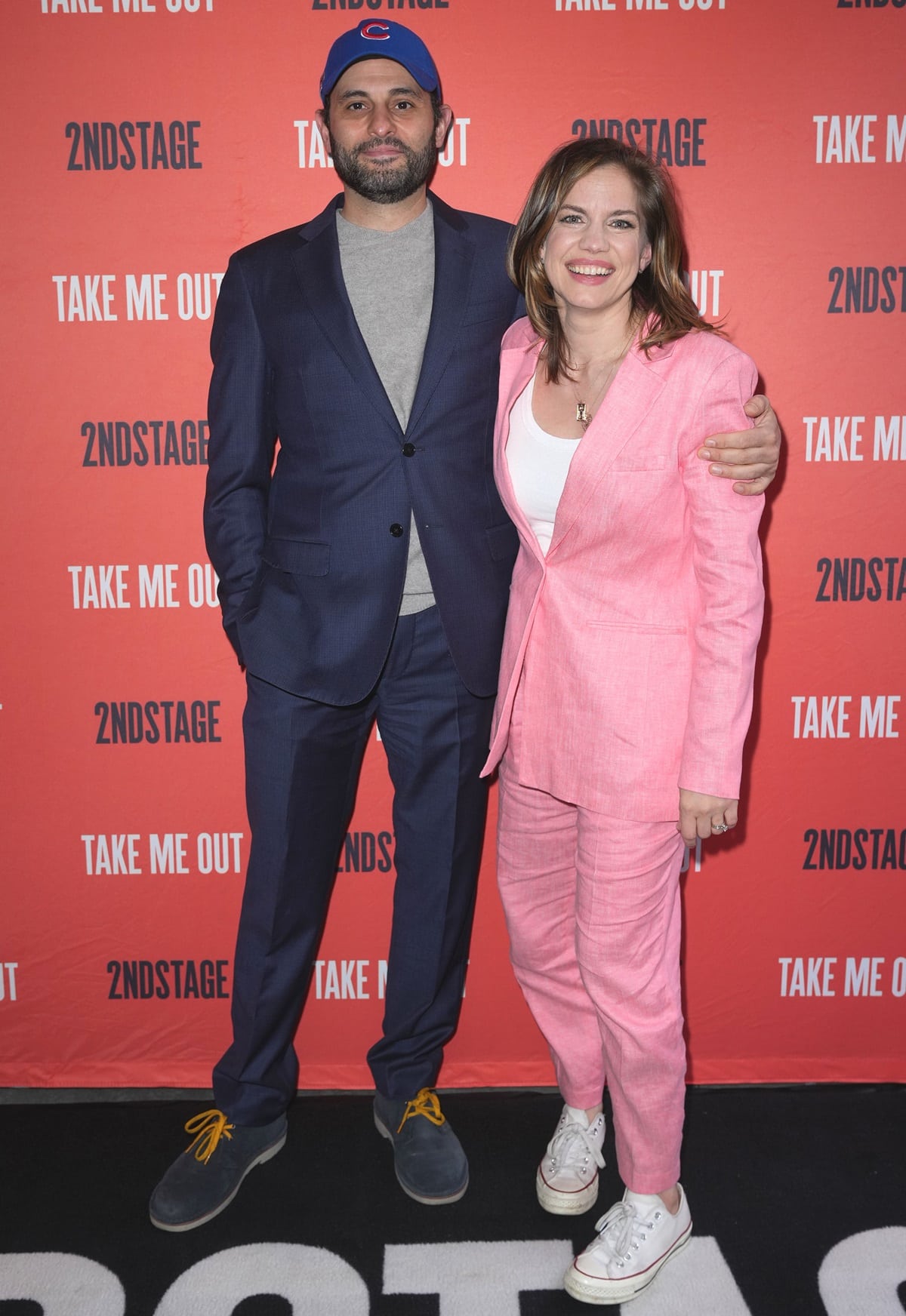 Arian Moayed sported a Chicago Cubs hat during the show, while his petite Inventing Anna co-star Anna Chlumsky showcased her style in a lovely light pink coat paired with matching pants at the opening night of Second Stage Theater's production of "Take Me Out"