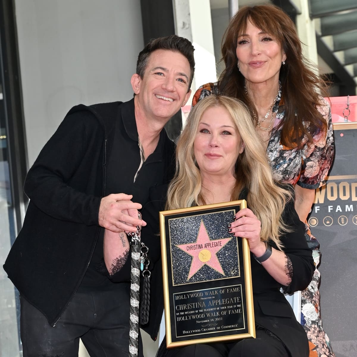 David Faustino, Katey Sagal, and Christina Applegate pose with Christina Applegate's star during her Hollywood Walk of Fame Ceremony at Hollywood Walk Of Fame