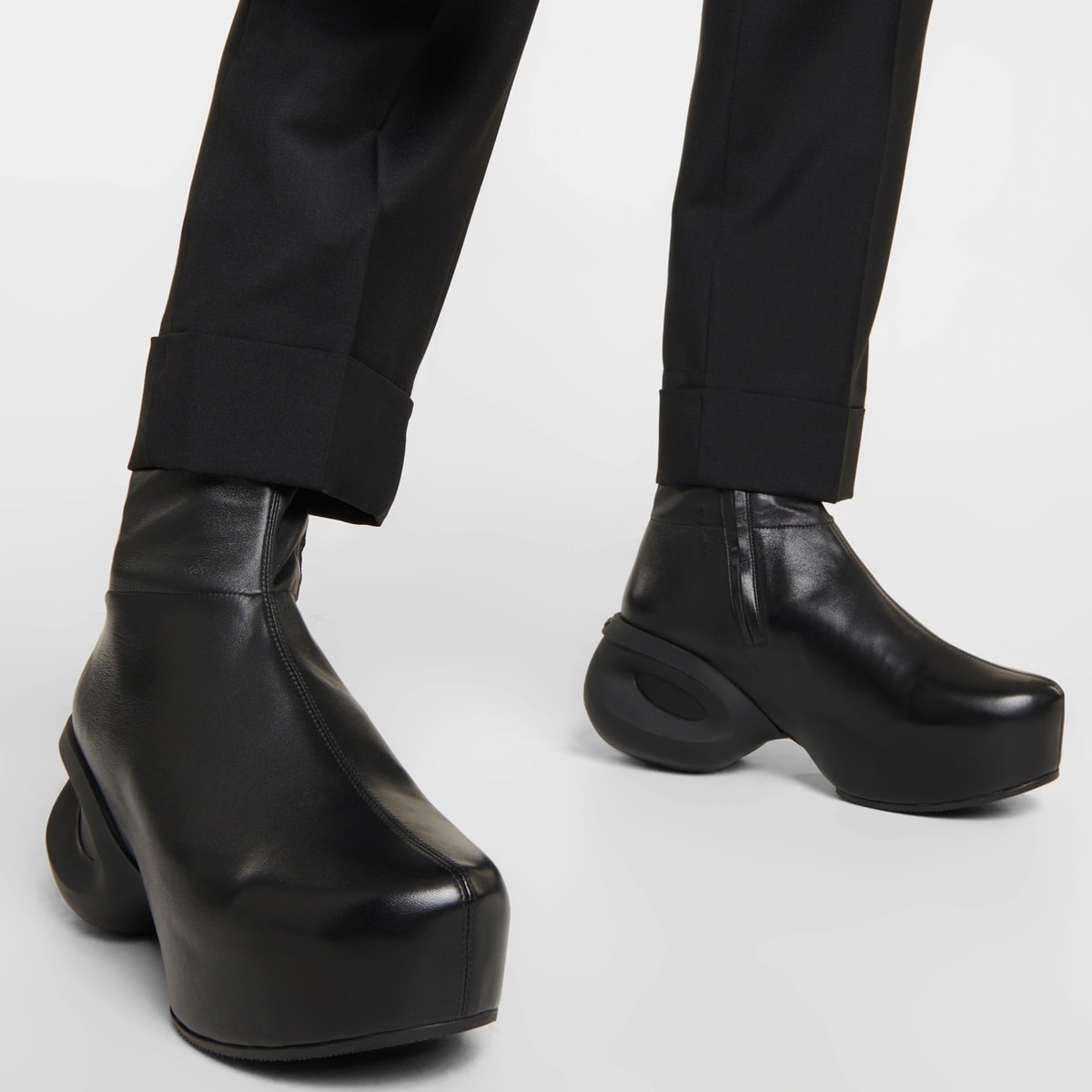 Givenchy masterfully balances style and comfort with these edgy Black G-Clog boots