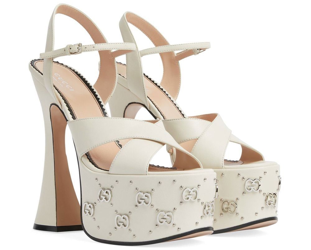The Gucci GG Stud-Detailed Platform Sandals are easily recognizable with the interlocking silver GG studs on the thick platforms