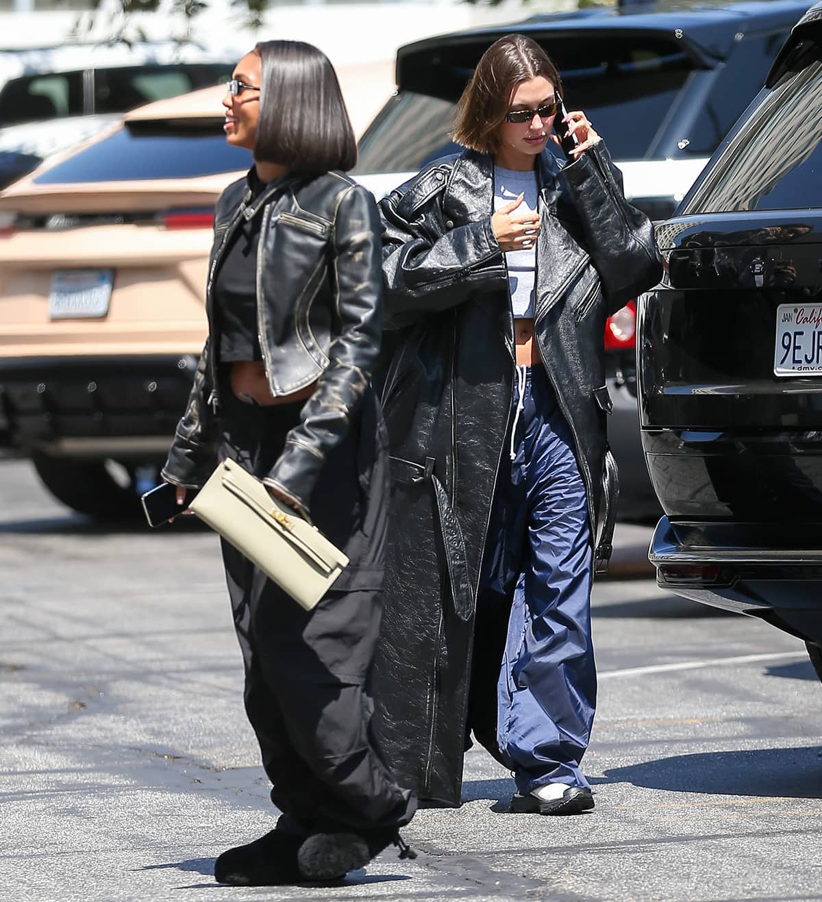 Hailey Bieber and Lori Harvey head to the movies with Justin Bieber in coordinating baggy pants in Los Angeles on June 2, 2023