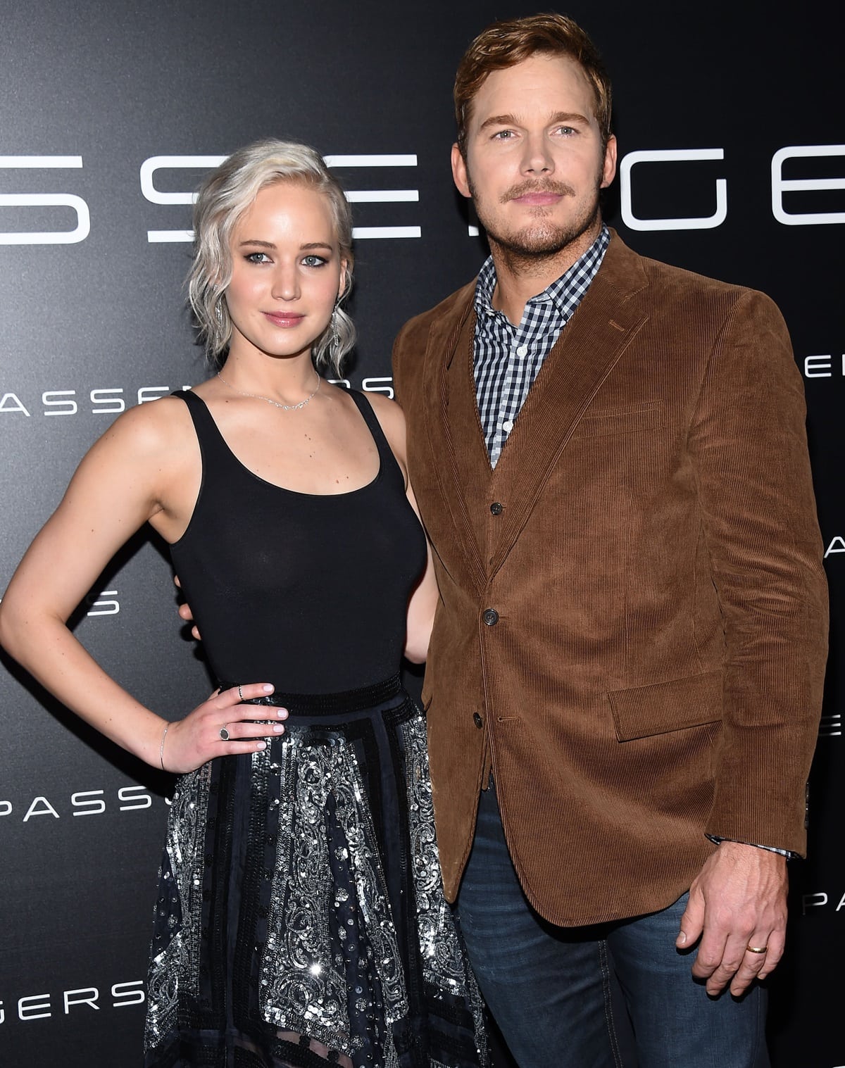 Chris Pratt towers over Jennifer Lawrence with a notable height difference, as he stands at 6'1.75
