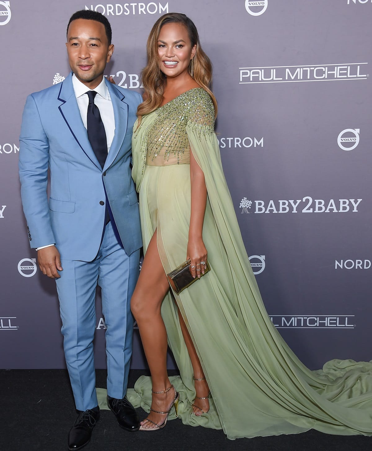 John Legend is reported to be around 5 feet 9 inches (175.3 cm) tall, making him slightly taller than Christine Teigen, with a difference of approximately 2 inches (5.1 cm)