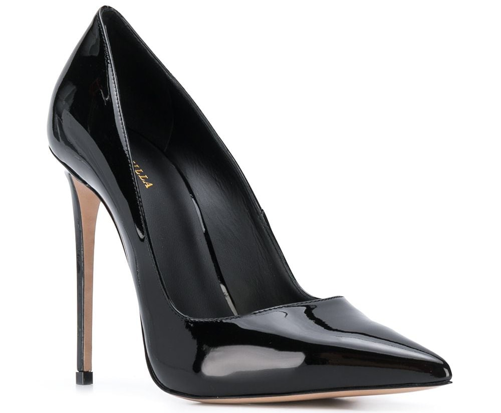 The Le Silla Eva is made of black patent leather and features a classic pointed toe silhouette and a high stiletto heel