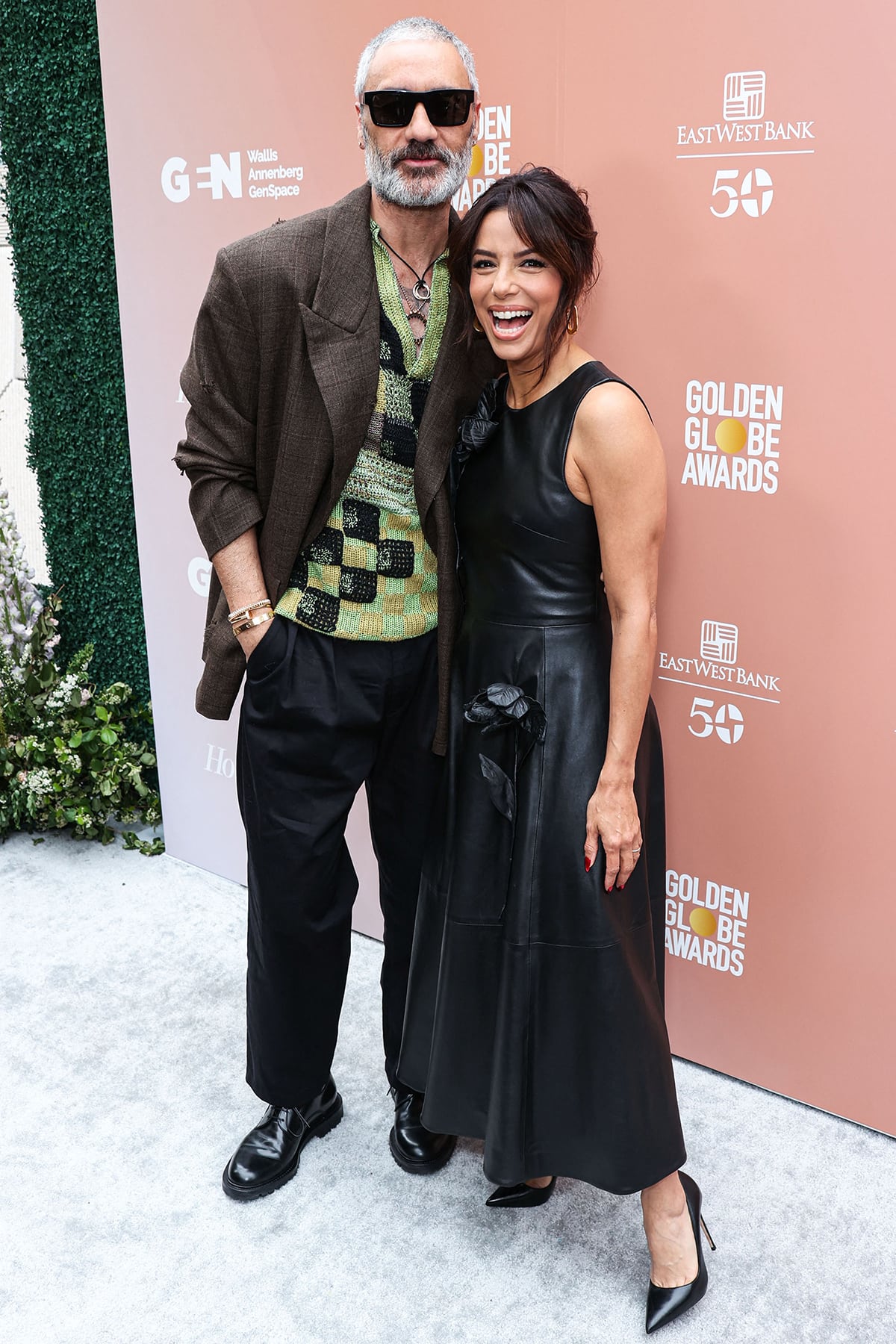 Eva Longoria poses with Rita Ora's filmmaker husband Taika Waititi, the evening's keynote speaker