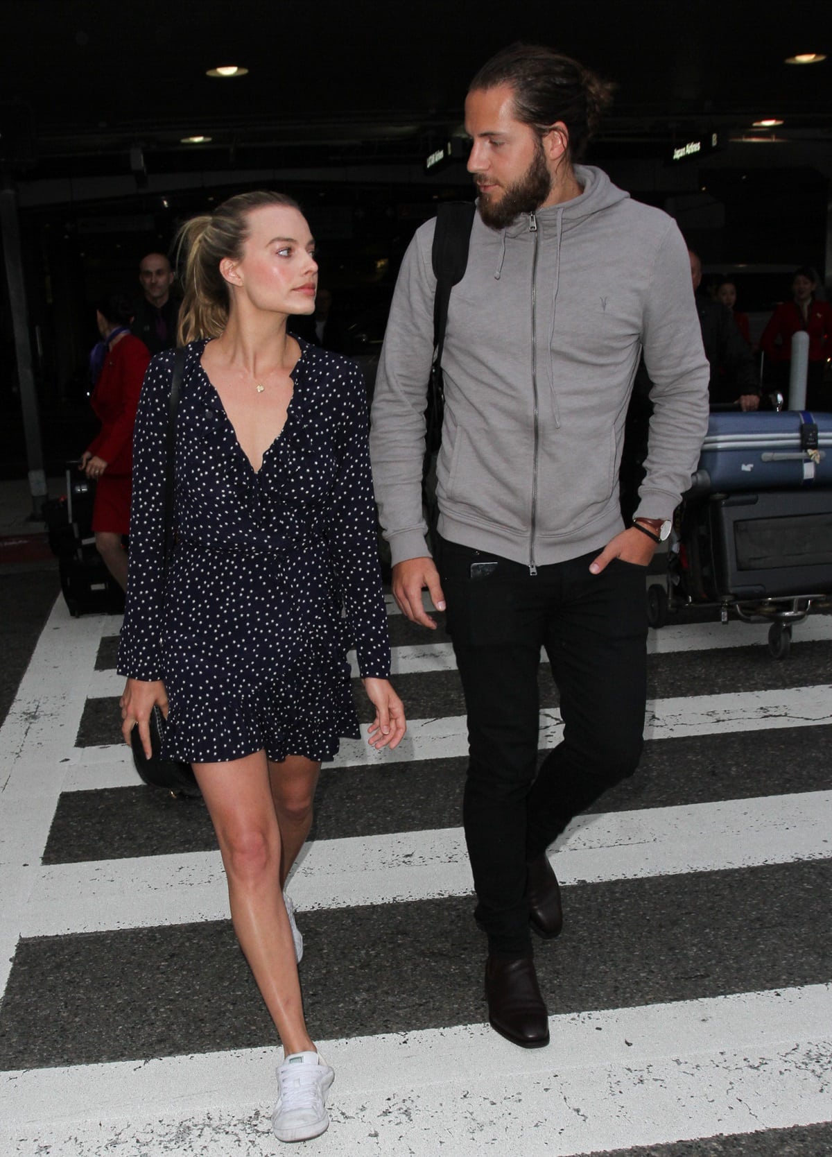 Tom Ackerley's height of 6 feet 3 inches (approximately 1.91 meters) makes him significantly taller than Margot Robbie, who stands at 5 feet 5 ½ inches (166.4 cm)