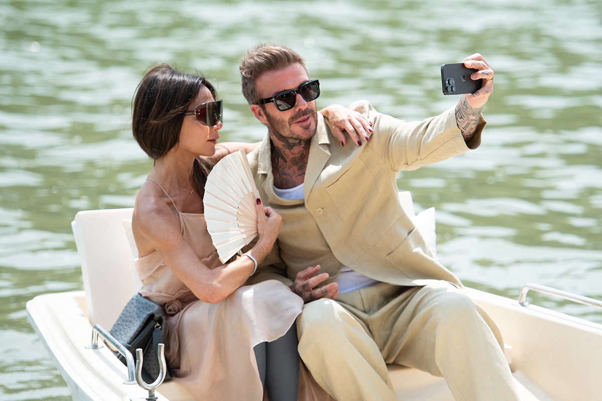 Victoria and David Beckham take selfies at Jacquemus Menswear Spring/Summer 2024 show as part of Paris Fashion Week on June 26, 2023