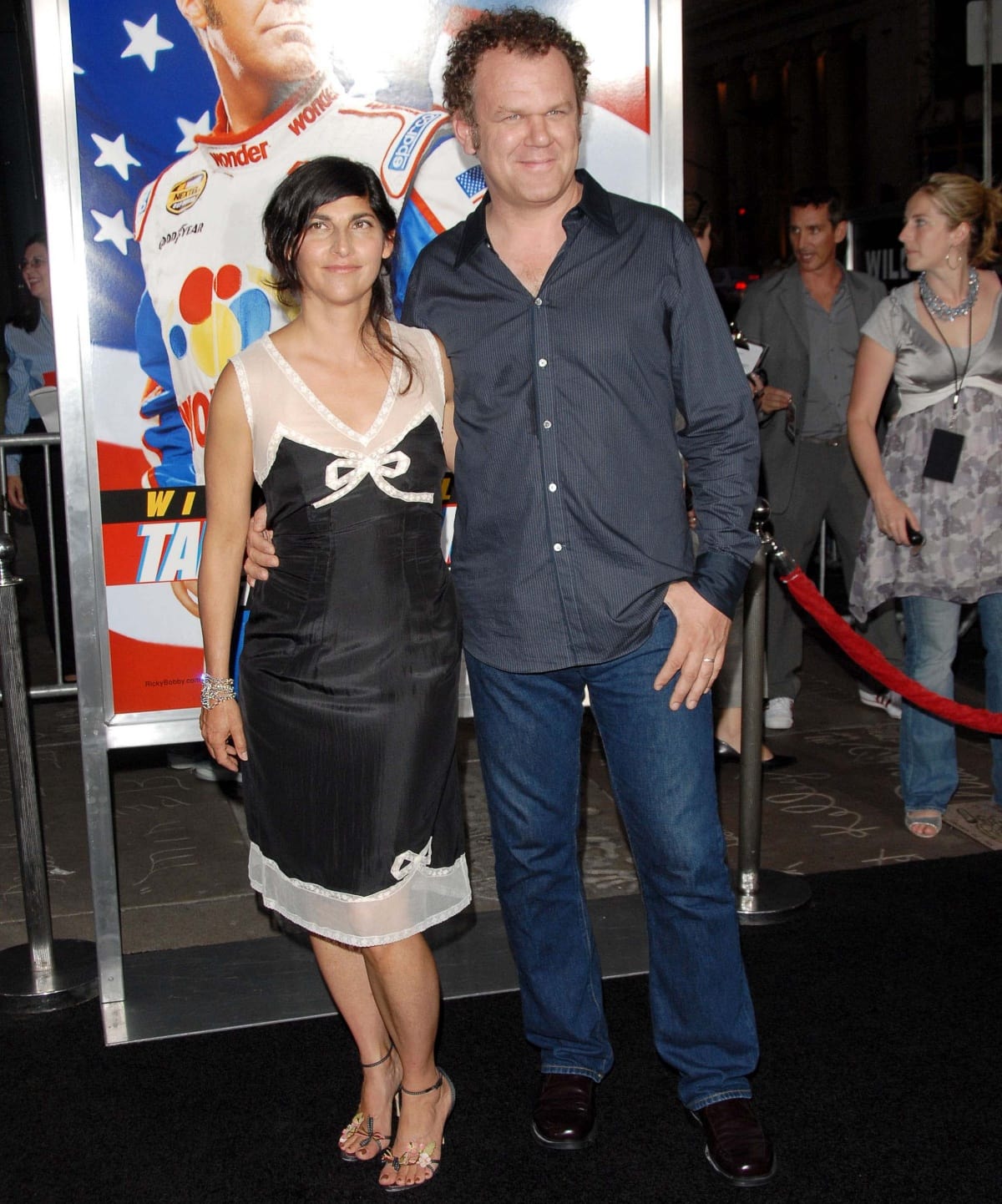 John C. Reilly towering over his wife Alison Dickey at the world premiere of Talladega Nights: The Ballad of Ricky Bobby