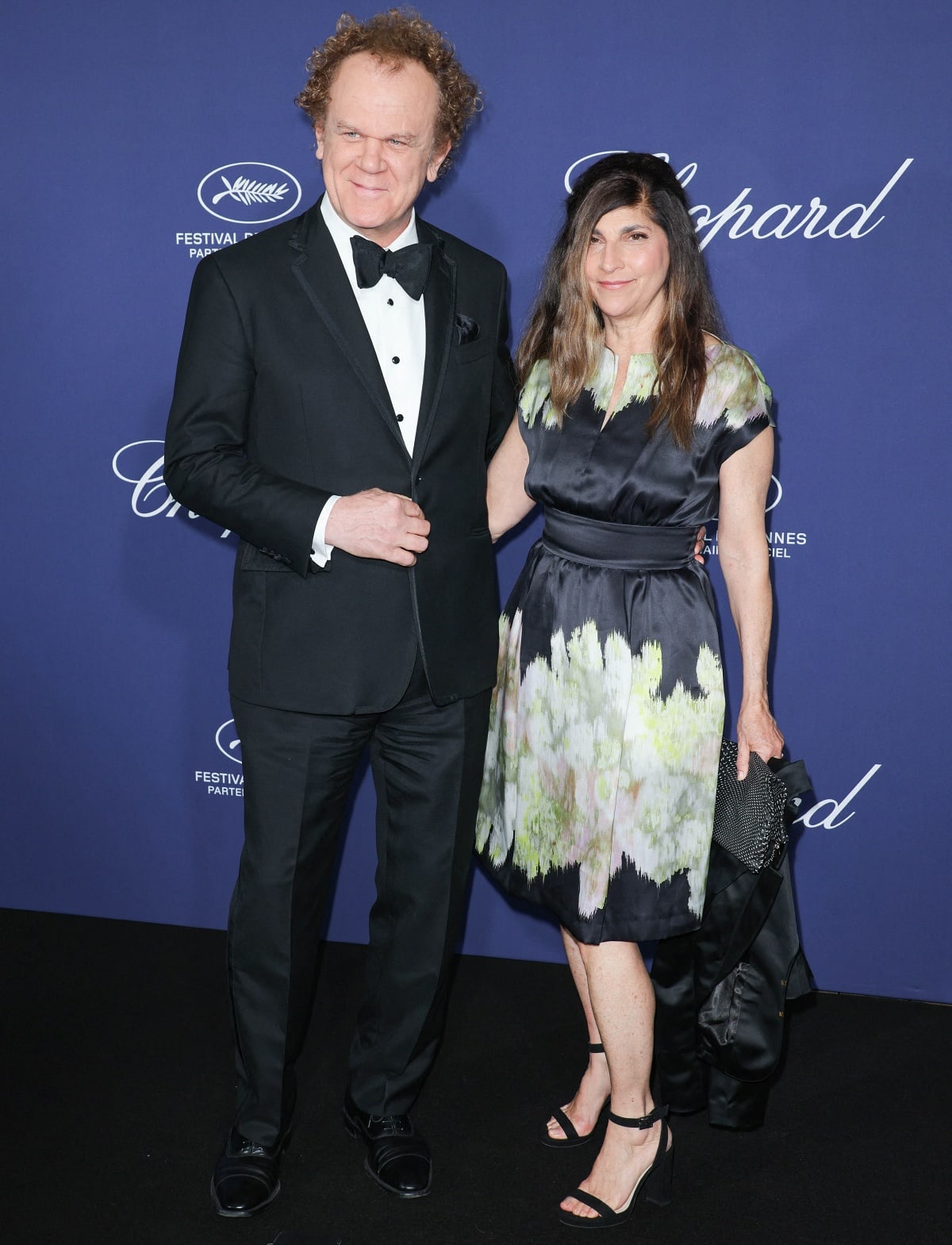 John C. Reilly and Alison Dickey attending the Chopard Trophy during the 76th Cannes Film Festival