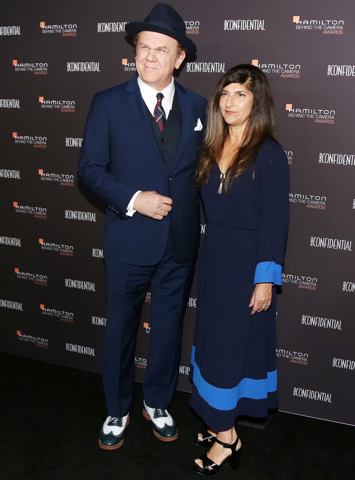 John C. Reilly and Alison Dickey in matching blue ensembles at the Hamilton Behind the Camera Awards presented by Los Angeles Confidential Magazine