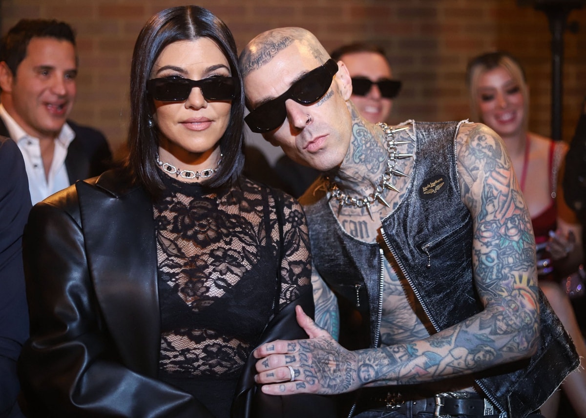 Kourtney Kardashian and Travis Barker at the Boohoo x Kourtney Kardashian Barker Spring/Summer 2023 fashion show during New York Fashion Week