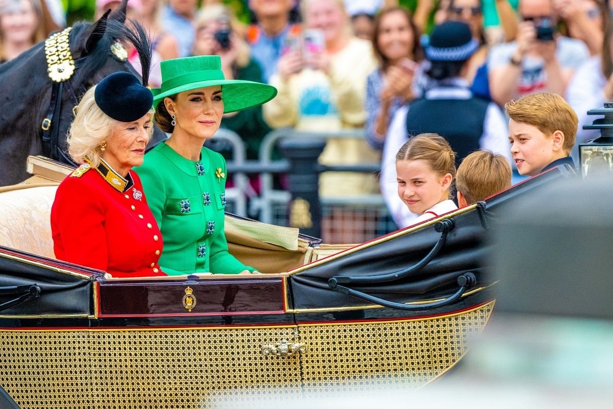 Catherine, Princess of Wales in an all-green ensemble with her three children and Queen Camilla during the Trooping the Colour ceremony
