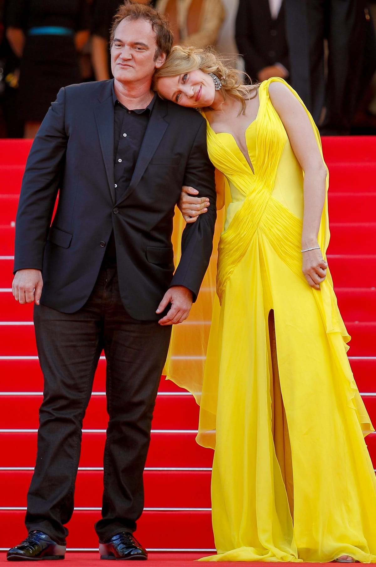 Quentin Tarantino and Uma Thurman keeping close to each other at the premiere of Sils Maria during the 67th Cannes Film Festival