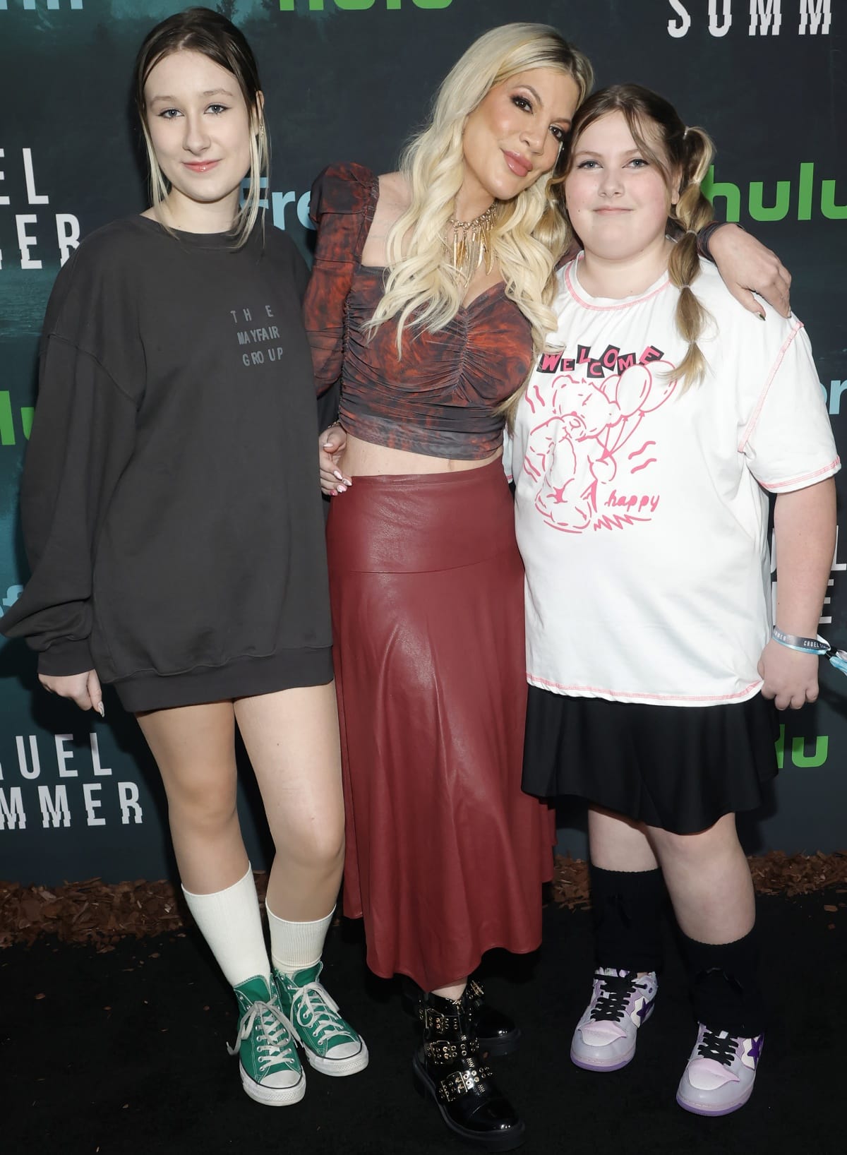 Stella McDermott, Tori Spelling, and Hattie McDermott spending a girls’ night out at the premiere of Cruel Summer Season 2