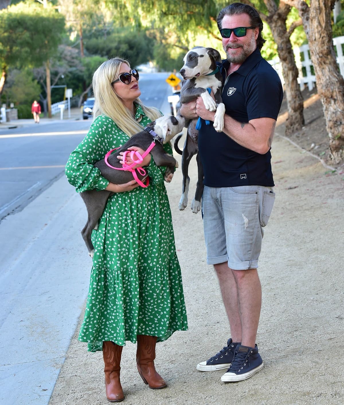 Tori Spelling and Dean McDermott taking a walk with their two dogs in Los Angeles
