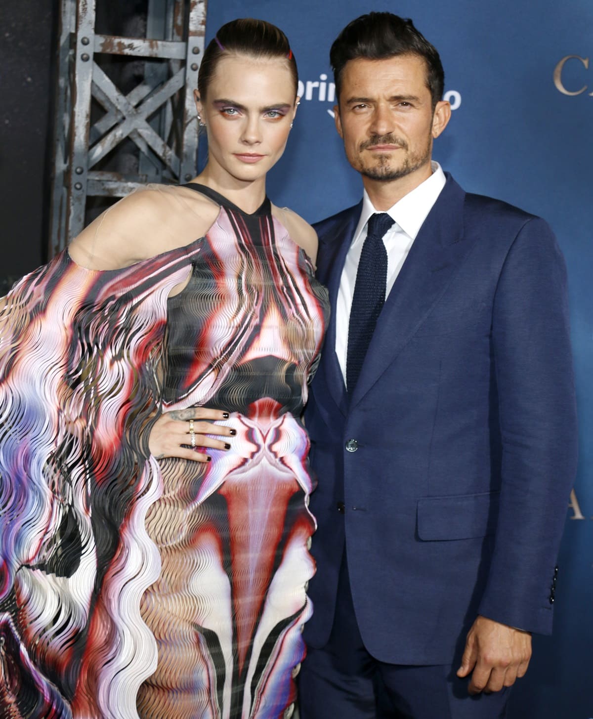 Cara Delevingne's height is 5ft 7 ¼ (170.8 cm), while Orlando Bloom's height is 5ft 10 ½ (179.1 cm)