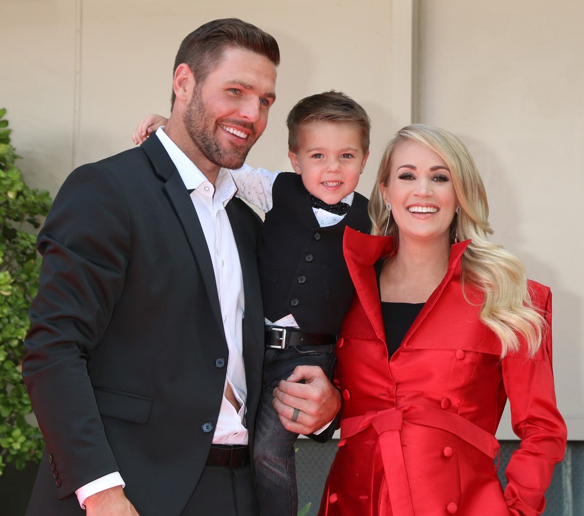 Carrie Underwood, who was pregnant with her second child, received a star on the Hollywood Walk of Fame and was joined by her husband, Mike Fisher, and her son, Isaiah Fisher, on the Hollywood Walk of Fame