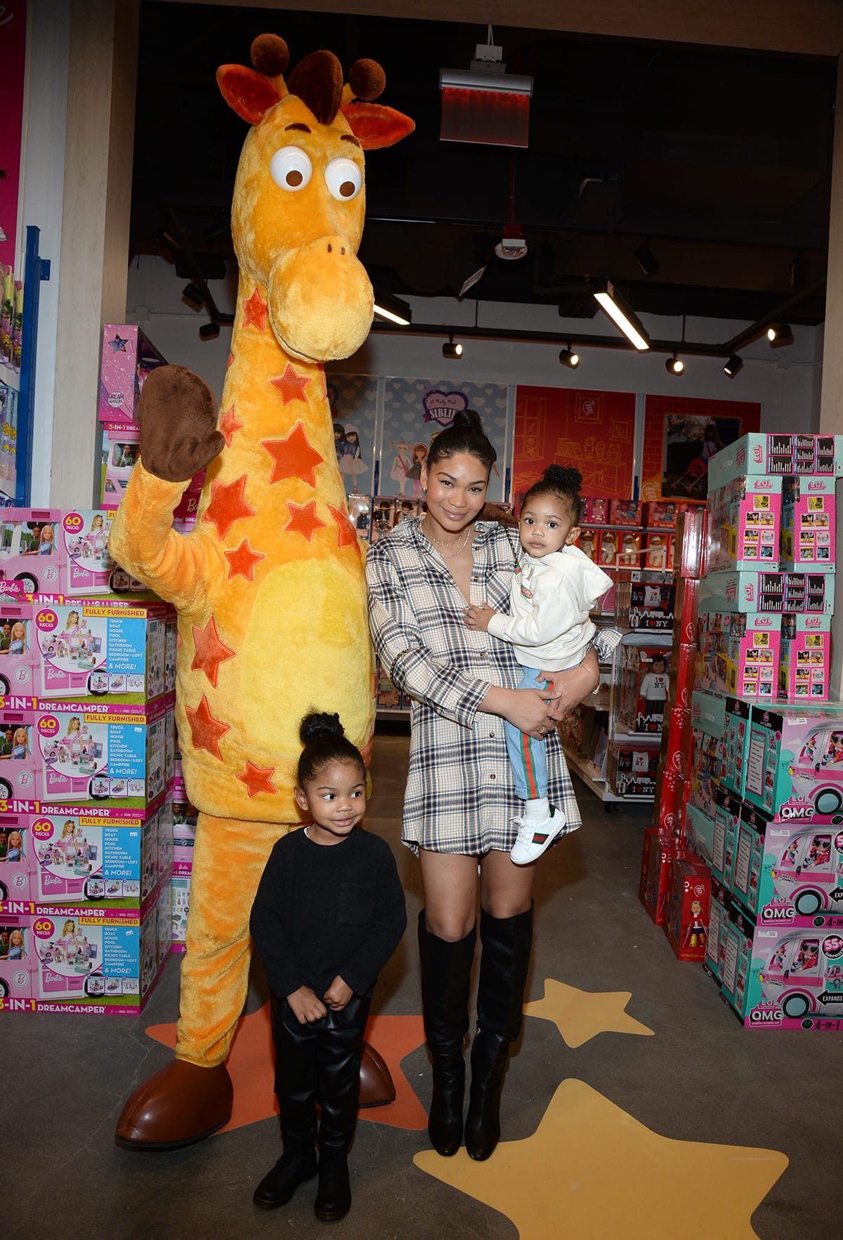 Chanel Iman with kids Cali Clay and Cassie Snow, whom she shares with ex-husband New York Giants wide receiver Sterling Shepard, at Toys R Us global flagship opening preview at American Dream mall in December 2021