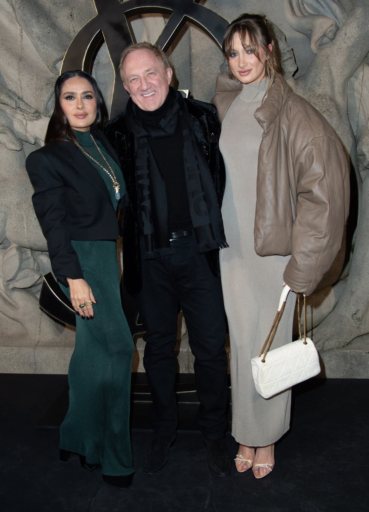 Salma Hayek, François-Henri Pinault, and Mathilde Pinault attend the Saint Laurent Womenswear Fall Winter 2023-2024 show