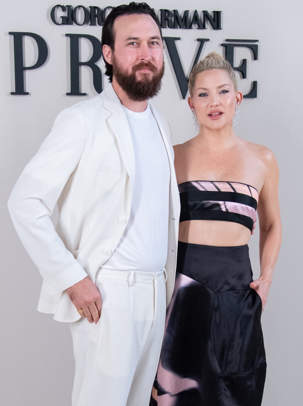 Engaged couple Danny Fujikawa and Kate Hudson stealing the show at the Giorgio Armani Prive Fall/Winter 2024 show during Paris Haute Couture Fashion Week