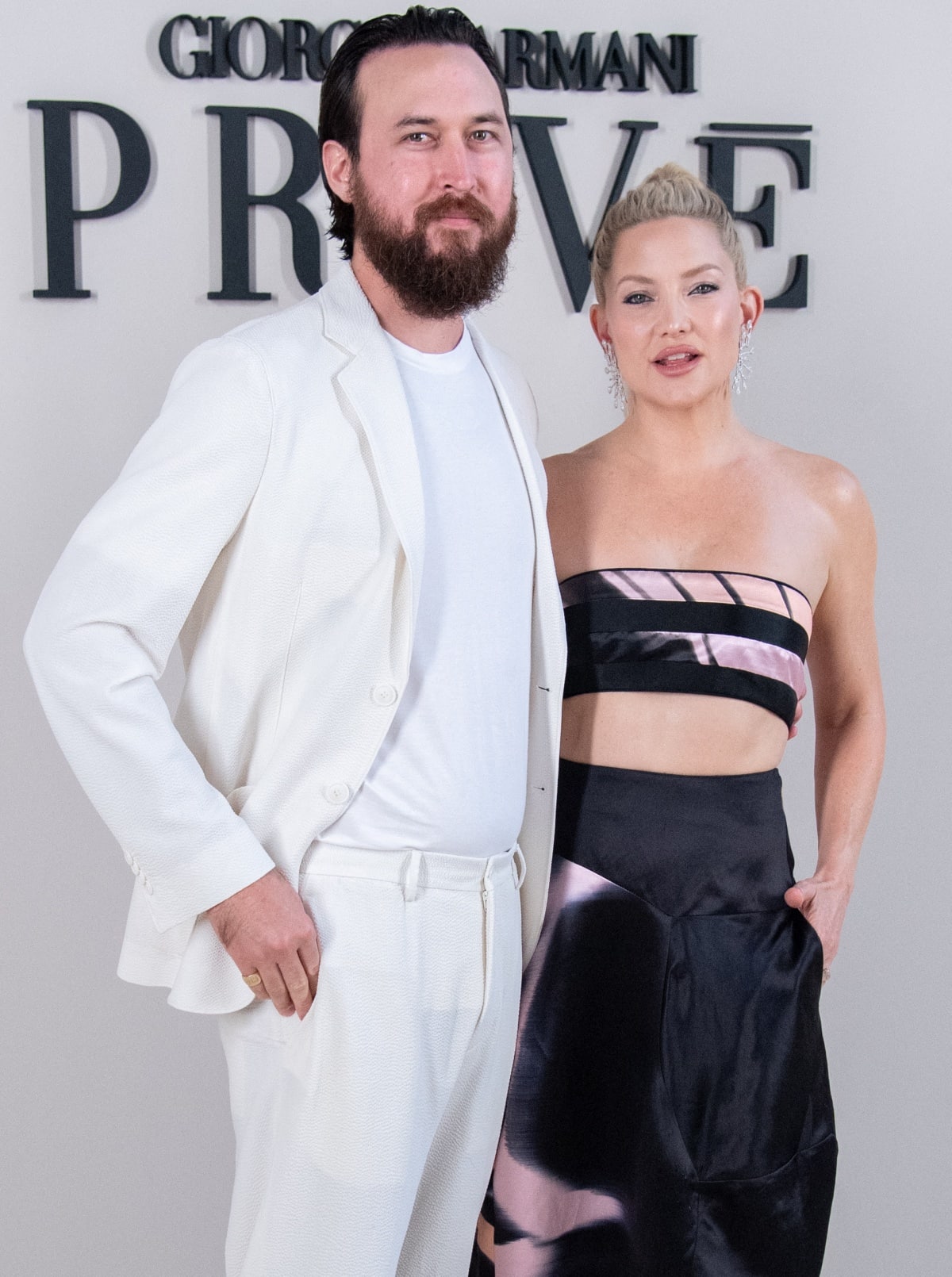 Engaged couple Danny Fujikawa and Kate Hudson stealing the show at the Giorgio Armani Privè Fall/Winter 2024 show during Paris Haute Couture Fashion Week
