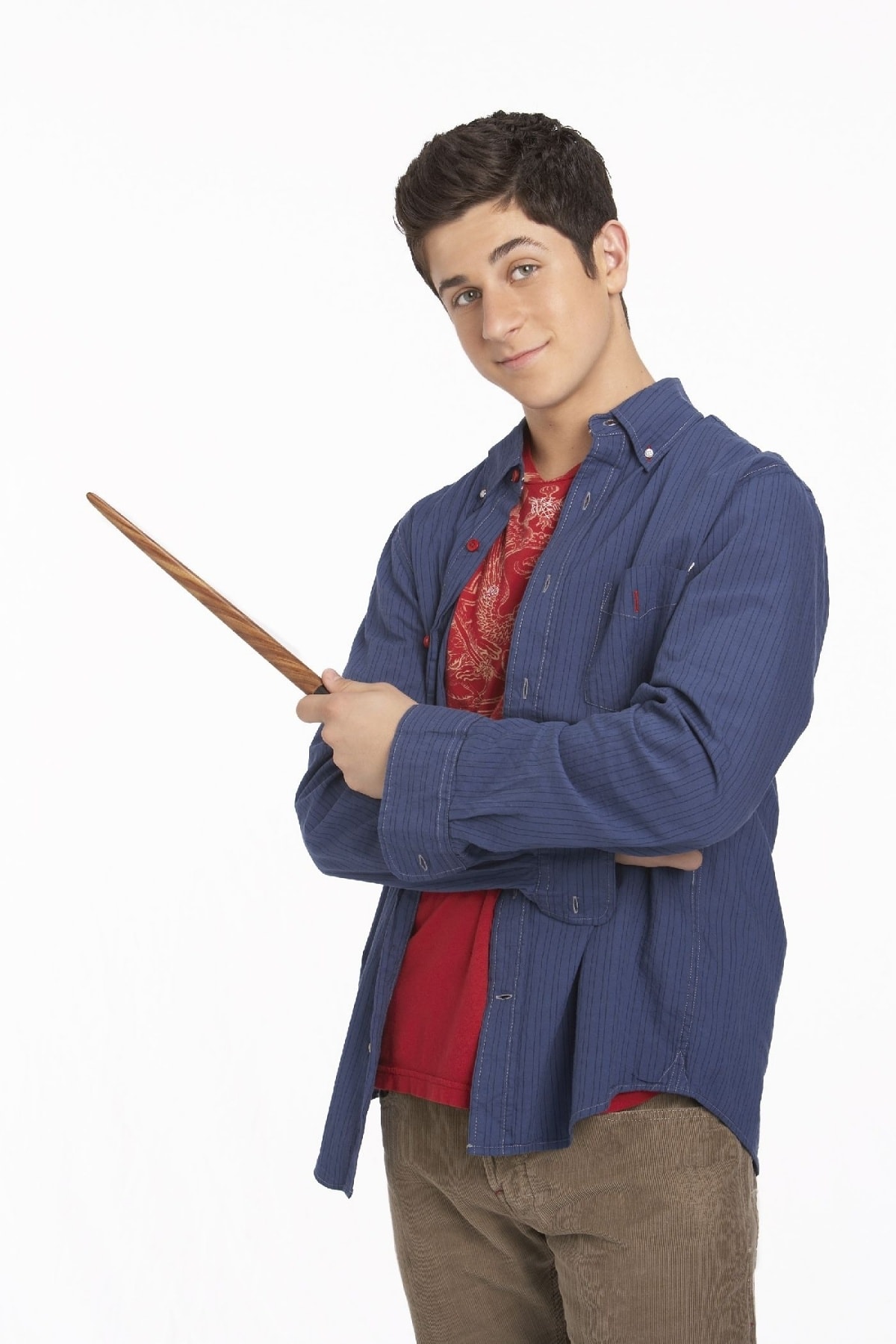 David Henrie as Justin Russo in a formal promo shot, bringing his character's intelligent and responsible demeanor to life in Wizards of Waverly Place