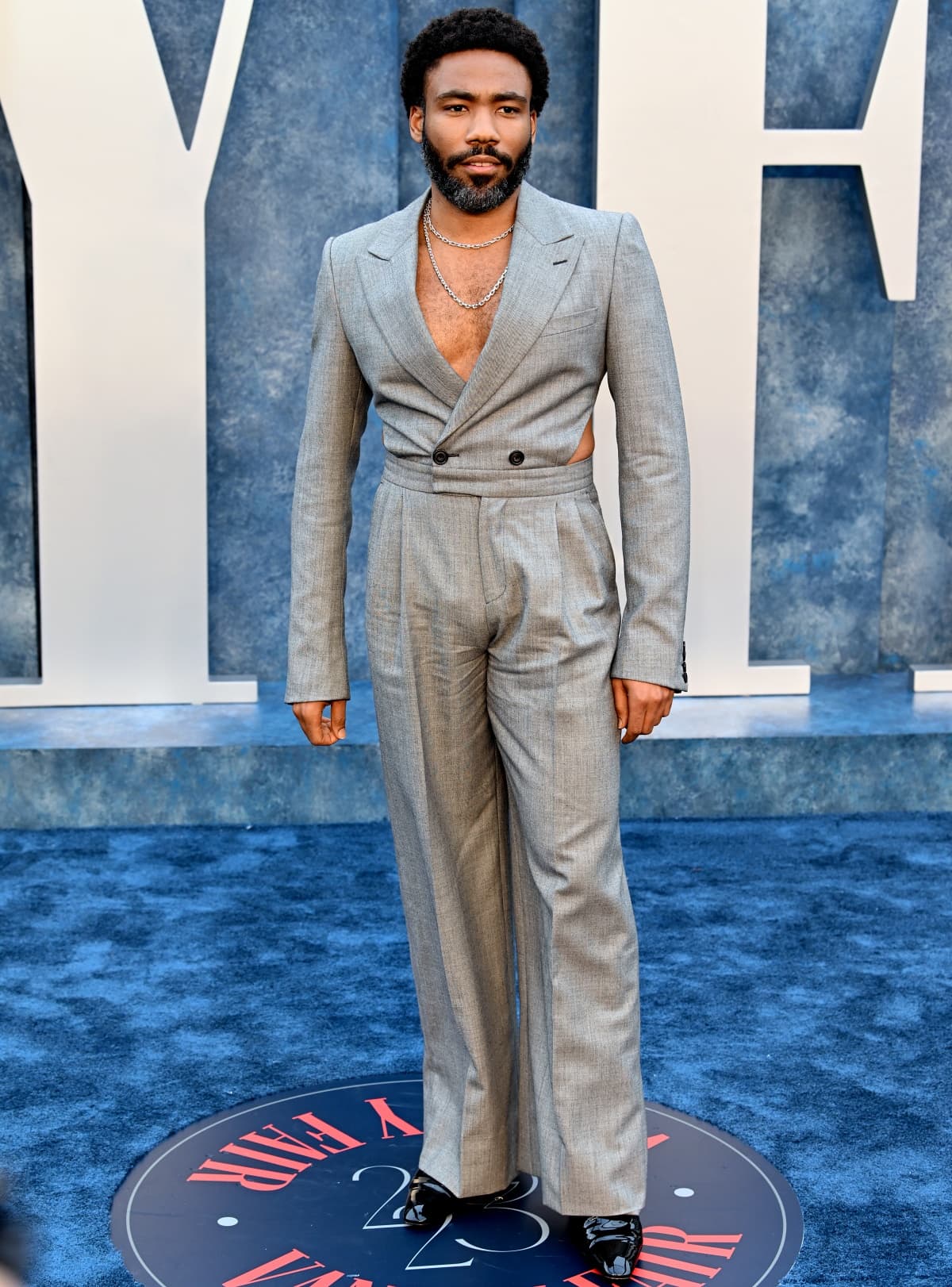 Donald Glover making a bold entrance at the 2023 Vanity Fair Oscar Party
