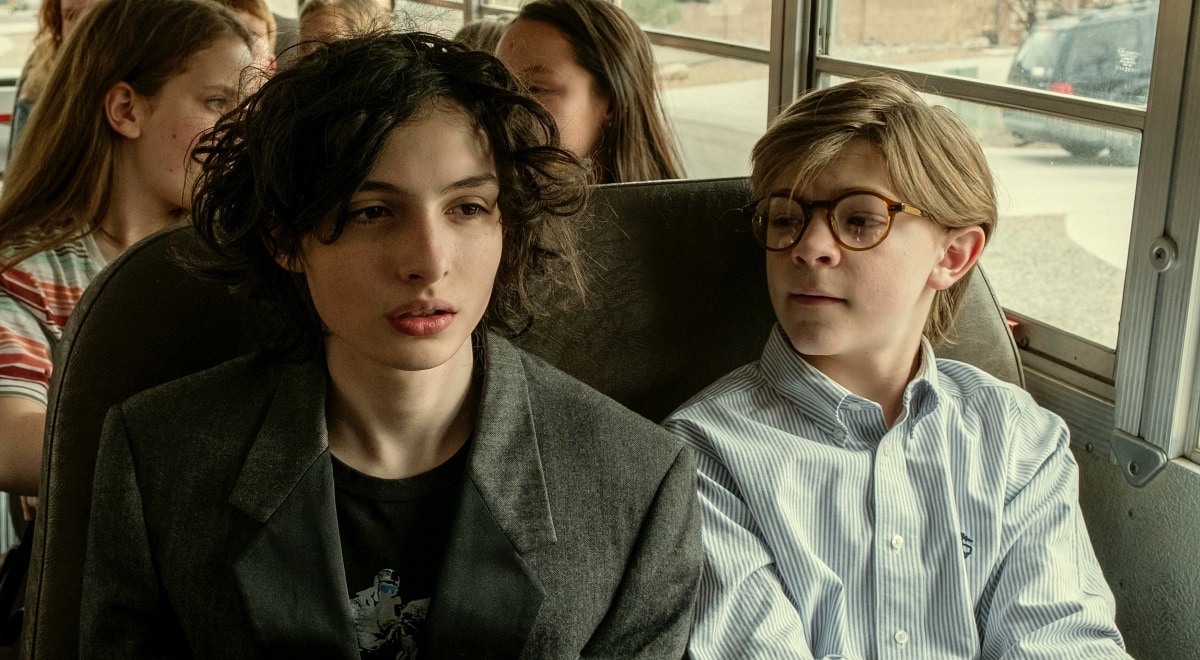 Finn Wolfhard as Young Boris Pavlikovsky and Oakes Fegley as Young Theodore Decker in the 2019 drama film The Goldfinch