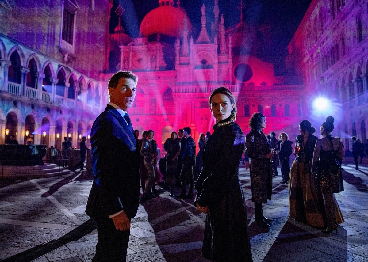 Tom Cruise as Ethan Hunt and Rebecca Ferguson as Ilsa Faust in the 2023 spy action film Mission: Impossible – Dead Reckoning Part One