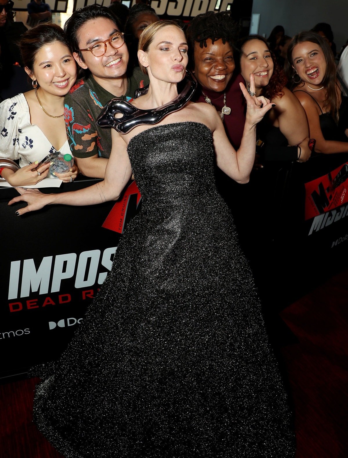 Rebecca Ferguson posing for photographs with fans at the New York premiere of Mission: Impossible – Dead Reckoning Part One