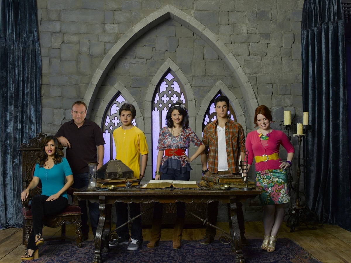 Season 4 promo shot of Wizards of Waverly Place featuring Maria Canals-Barrera, David DeLuise, Jake T. Austin, Selena Gomez, David Henrie, and Jennifer Stone