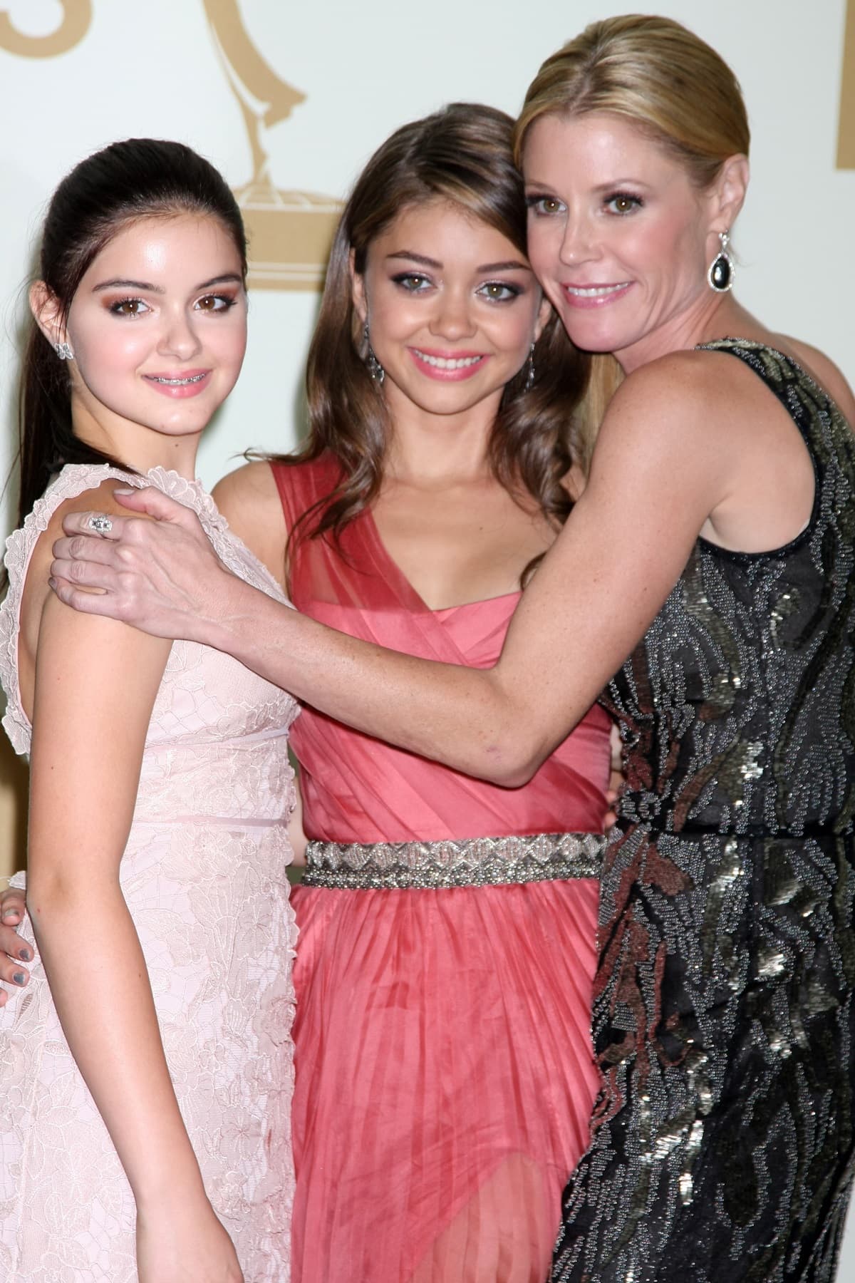 Ariel Winter, Sarah Hyland, and Julie Bowen, who all starred in the popular sitcom Modern Family, attend the 63rd Annual Primetime Emmy Awards