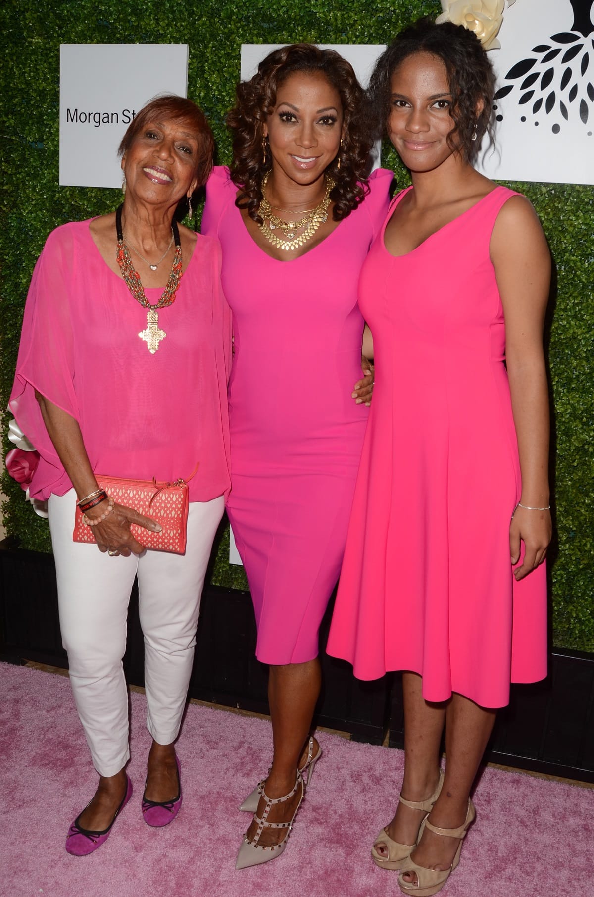 Dolores Robinson, accompanied by her daughter Holly Robinson Peete and granddaughter Ryan Elizabeth Peete, graces the arrivals of the Ladylike Foundation's 8th Annual Women Of Excellence Luncheon at The Beverly Hilton Hotel on June 4, 2016, in Beverly Hills, California