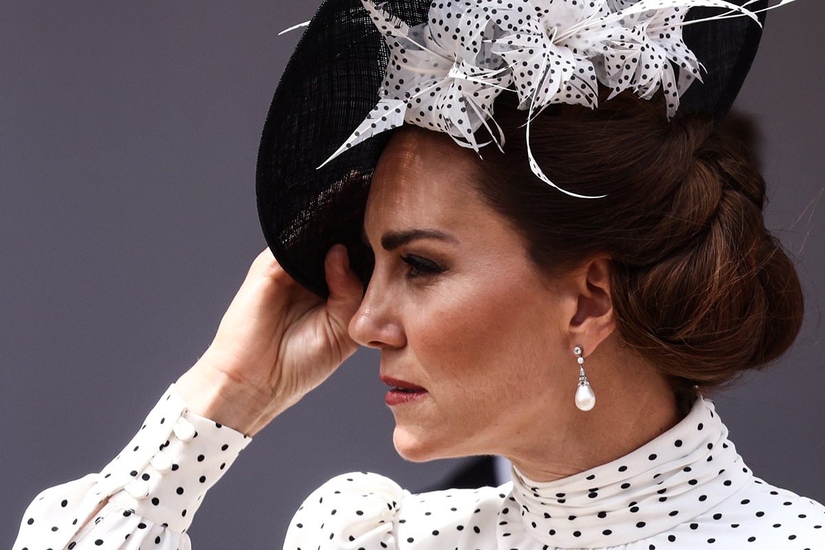 Kate Middleton pairs her dotted dress with a matching Philip Treacy hat and Princess Diana’s Collingwood Pearl and Diamond earrings
