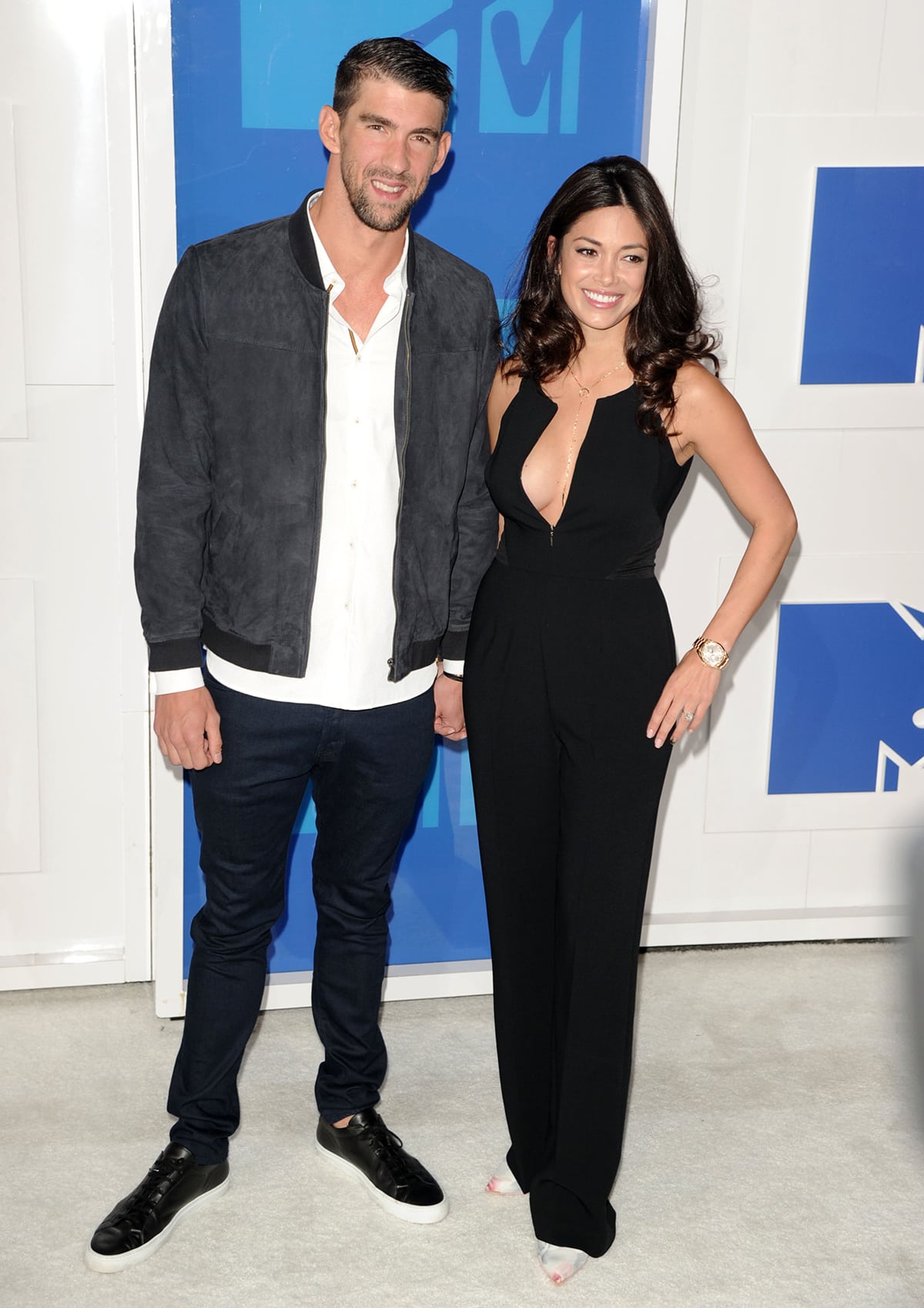 Michael Phelps and Nicole Johnson, pictured at the 2016 MTV Video Music Awards, reconciled years later and got engaged in February 2015