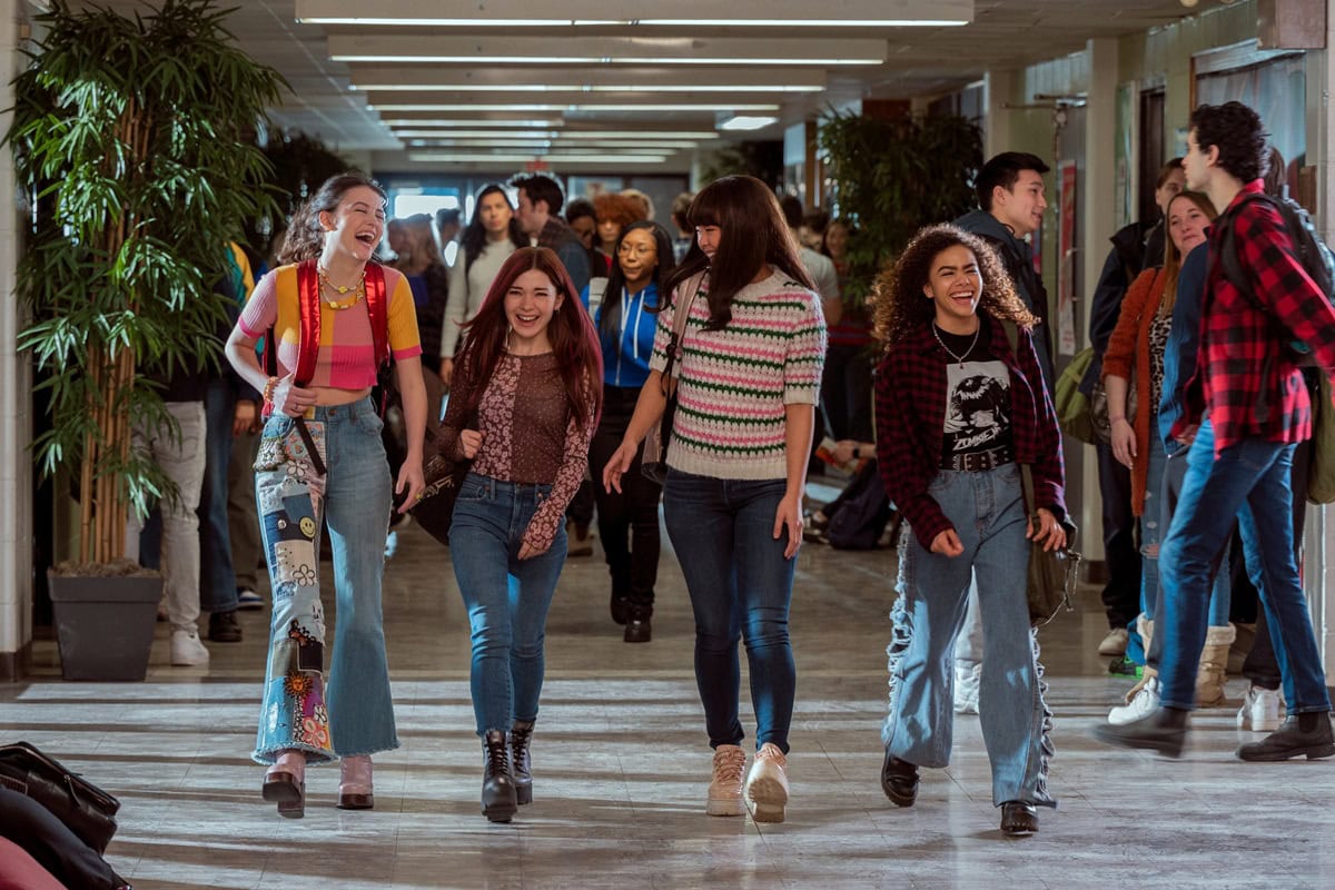 Sara Waisglass, Katie Douglas, Chelsea Clark, and Antonia Gentry bring their distinct teen fashion styles to the halls of Ginny & Georgia, showcasing vibrant colors, trendy denim, and playful layering