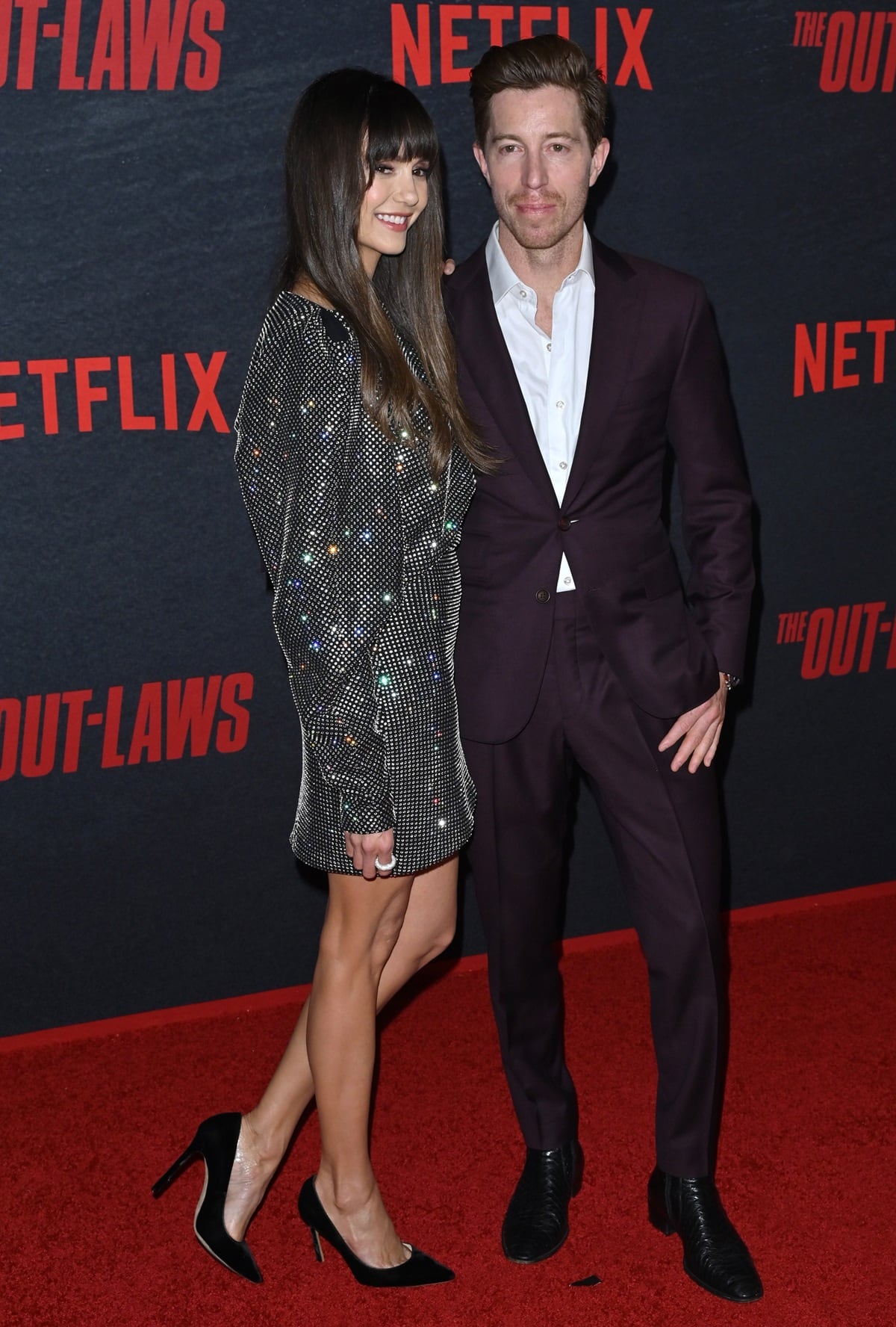 Shaun White is taller than Nina Dobrev, with a height of 5 feet 8 inches (173 cm), while Nina Dobrev stands at 5 feet 5 ¼ inches (165.7 cm)
