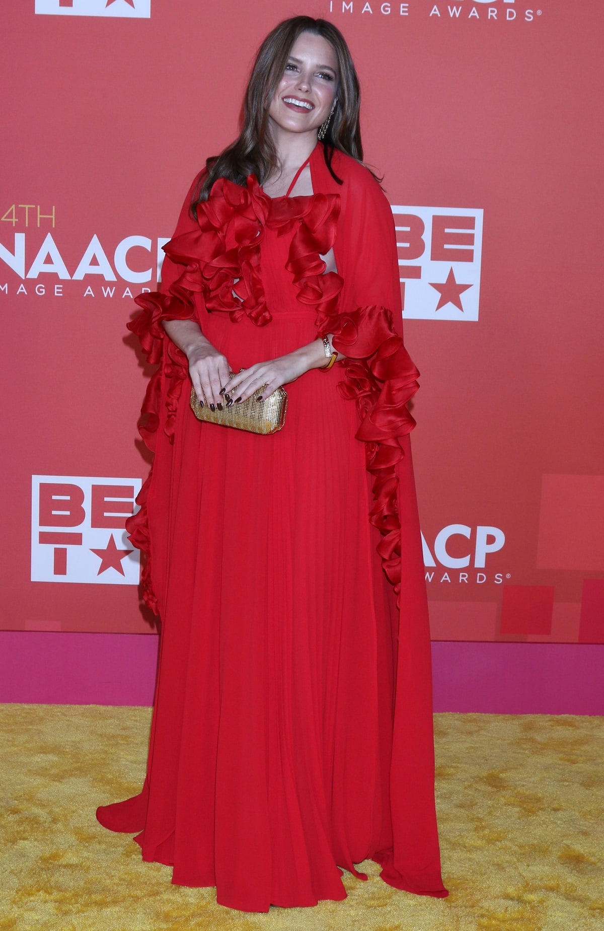 Sophia Bush looked stunning in a flowing, ruffled red dress at the 54th NAACP Image Awards