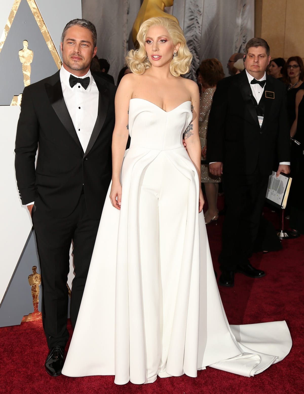 Taylor Kinney stands at a height of 5 feet 10 ½ inches (179.1 cm), while Lady Gaga's height is 5 feet 1 ¼ inches (155.6 cm)