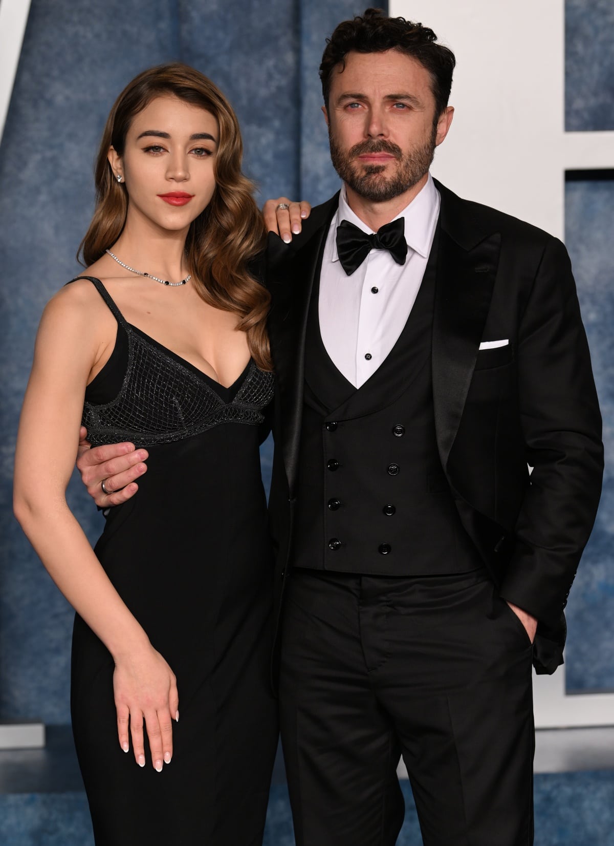 Actor Casey Affleck and his girlfriend, Caylee Cowan, pose