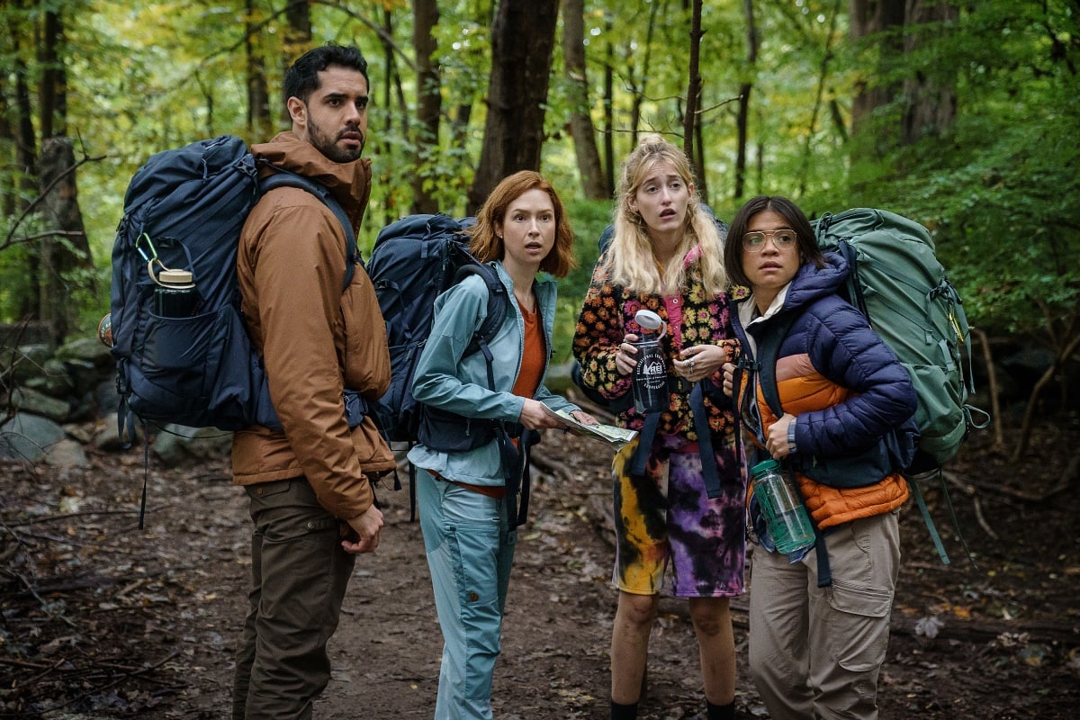 Esteban Benito as Mason, Ellie Kemper as Helen, Gus Birney as Kaylee, and Julia Shiplett as Sue in the 2023 American romantic comedy Happiness for Beginners