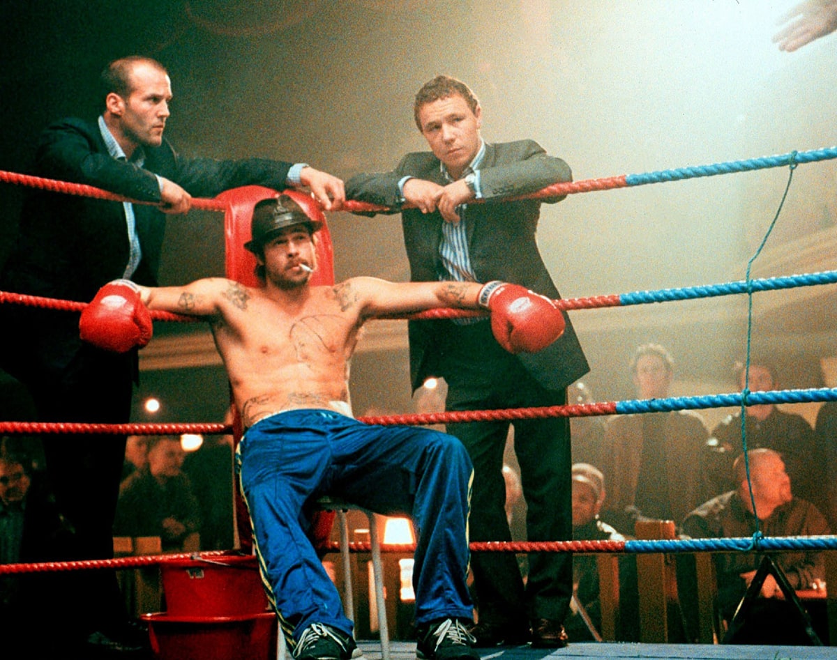 Jason Statham plays small-time boxing promoter, Turkish, alongside Brad Pitt as Mickey O’Neil and Stephen Graham as Tommy in the 2000 crime comedy Snatch