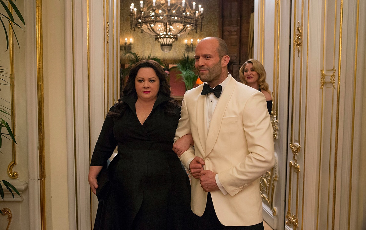 Melissa McCarthy as Susan Cooper and Jason Statham as Rick Ford in the 2015 spy action comedy movie Spy